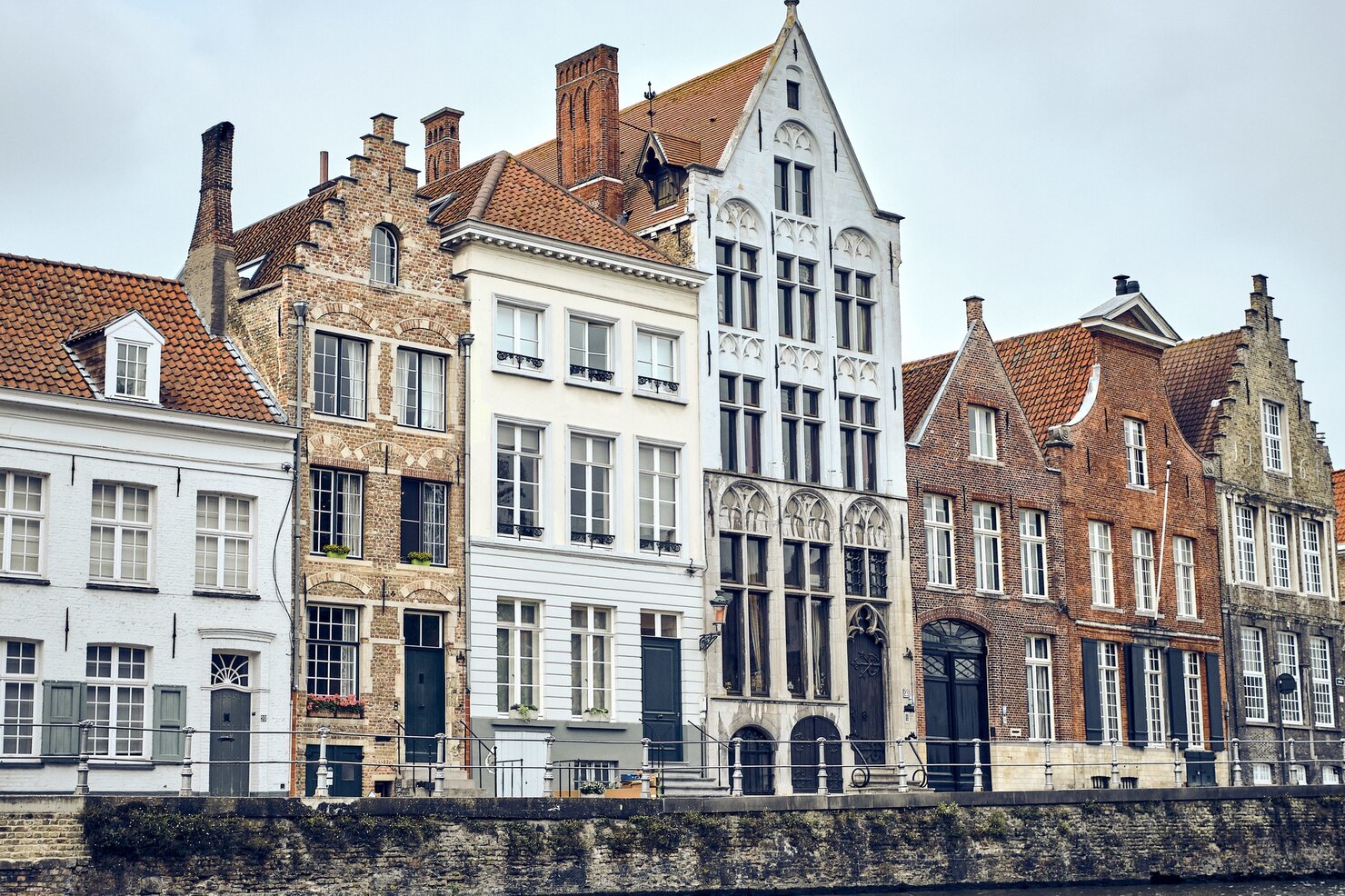 view of an old town of bruges in belgium on a white sky 181624 41162